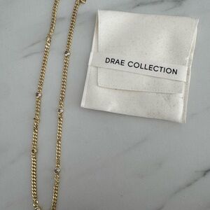 Gold Necklace with Silver Details